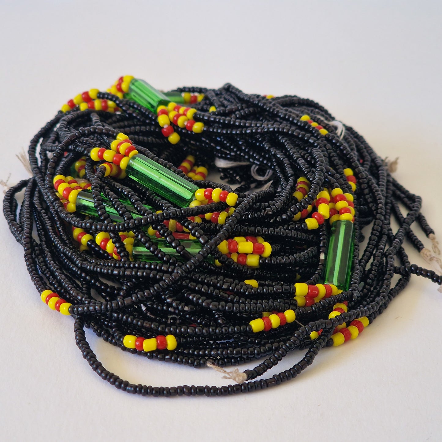 Zwart, geel, rood & groen 3 in 1 waistbeads